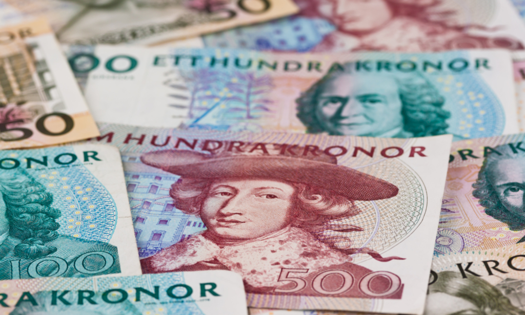 Krona rallies as Riksbank flags earlier rate hike
